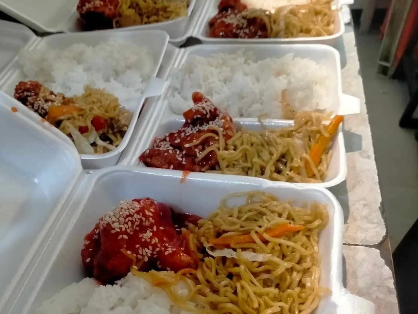 Buffalo Chicken And Pansit Guisado with drinks