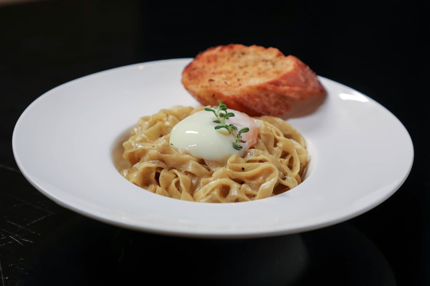 Truffle with Sous Vide Egg and Garlic Bread