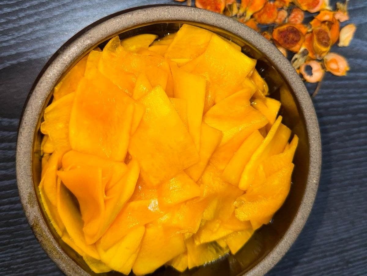 Pickled  yellow radish.  - HALF