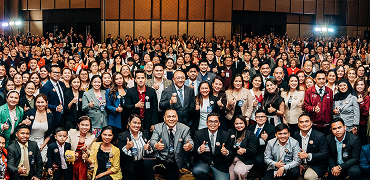 Group photo of attendees at a live training session